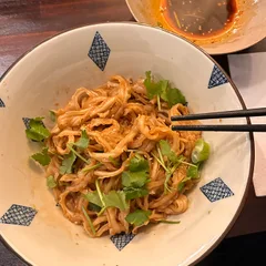 Noodles topped with coriander and spring onions at Bia & Ban in Munich