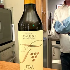 A bottle of Tement wine on the counter at Das Obers in Munich